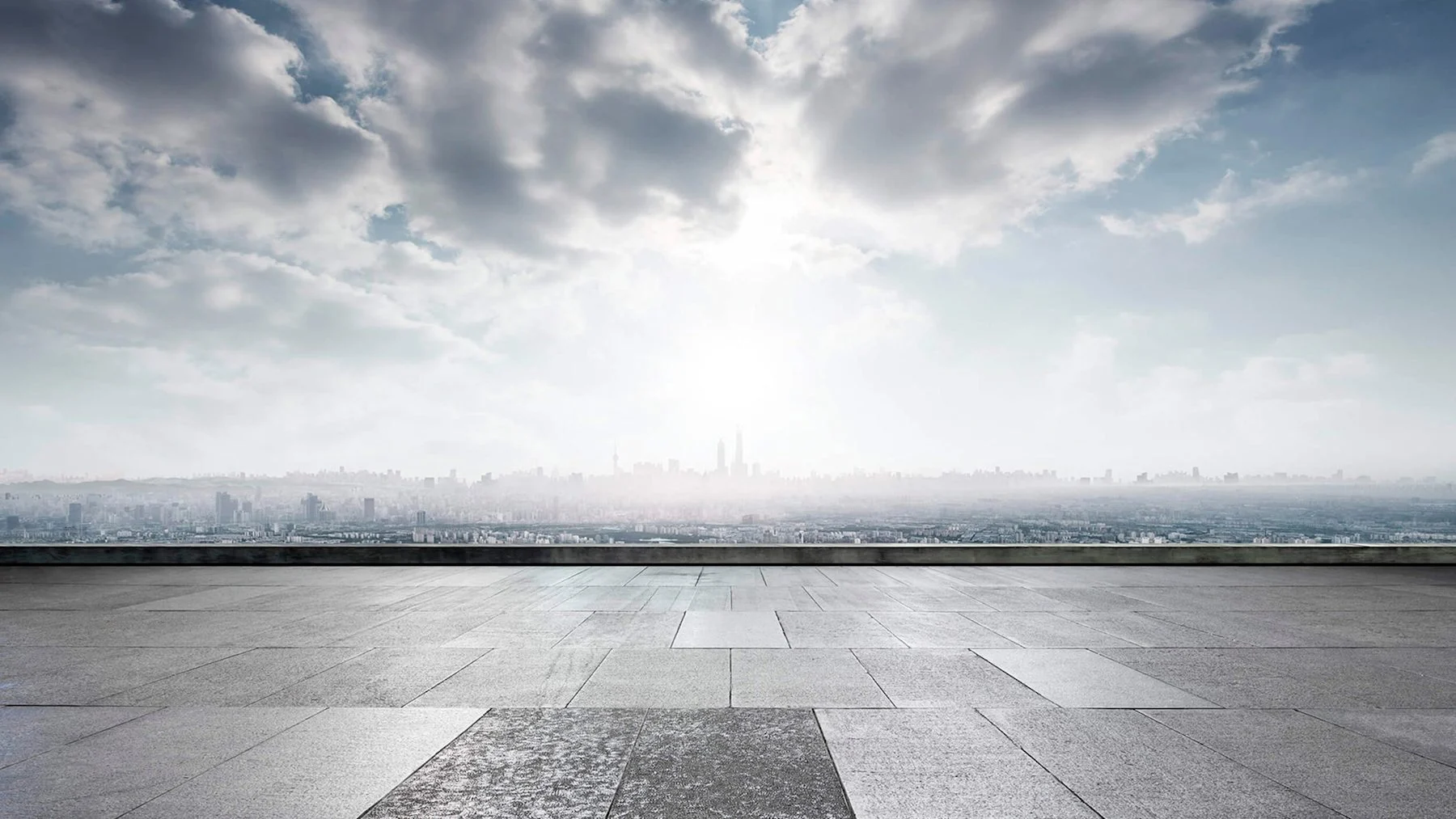 View from a rooftop terrace across a metropolitan skyline — key visual of the 2019 Fundament website
